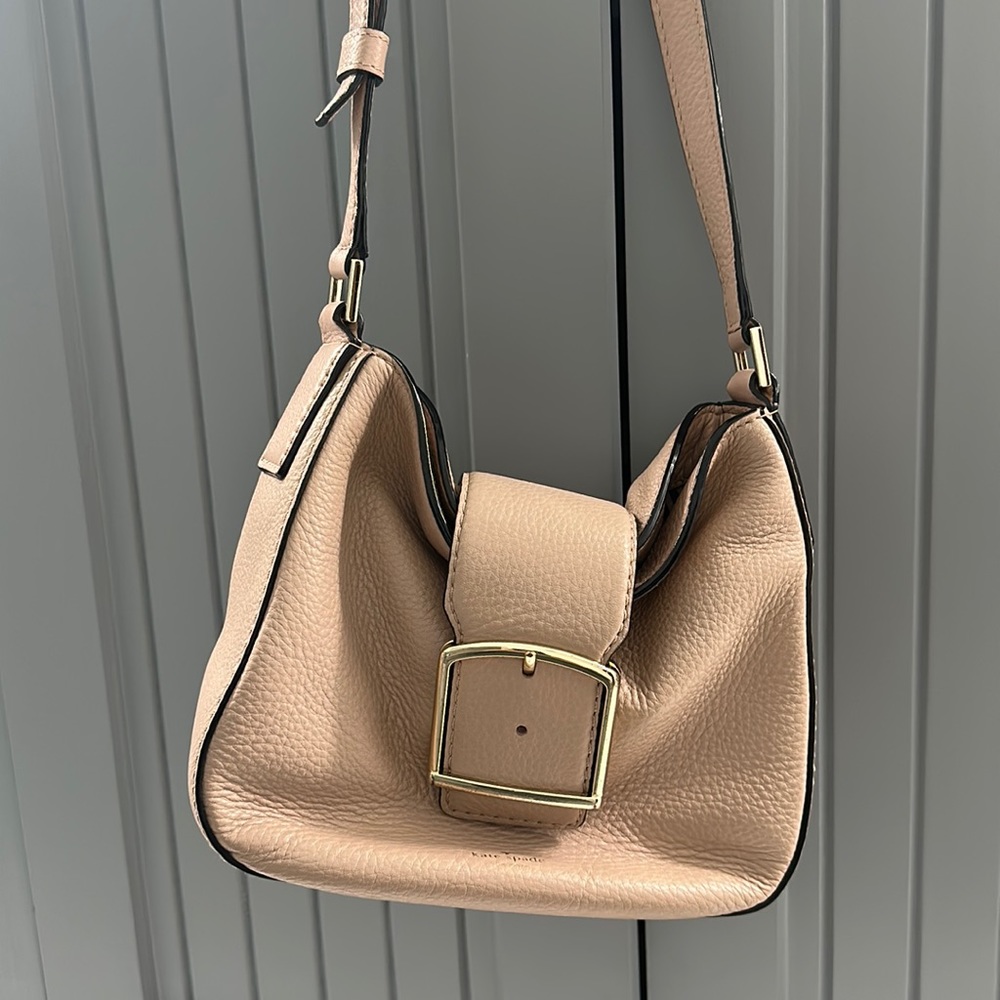 Kate Spade crossbody purse with adjustable strap.